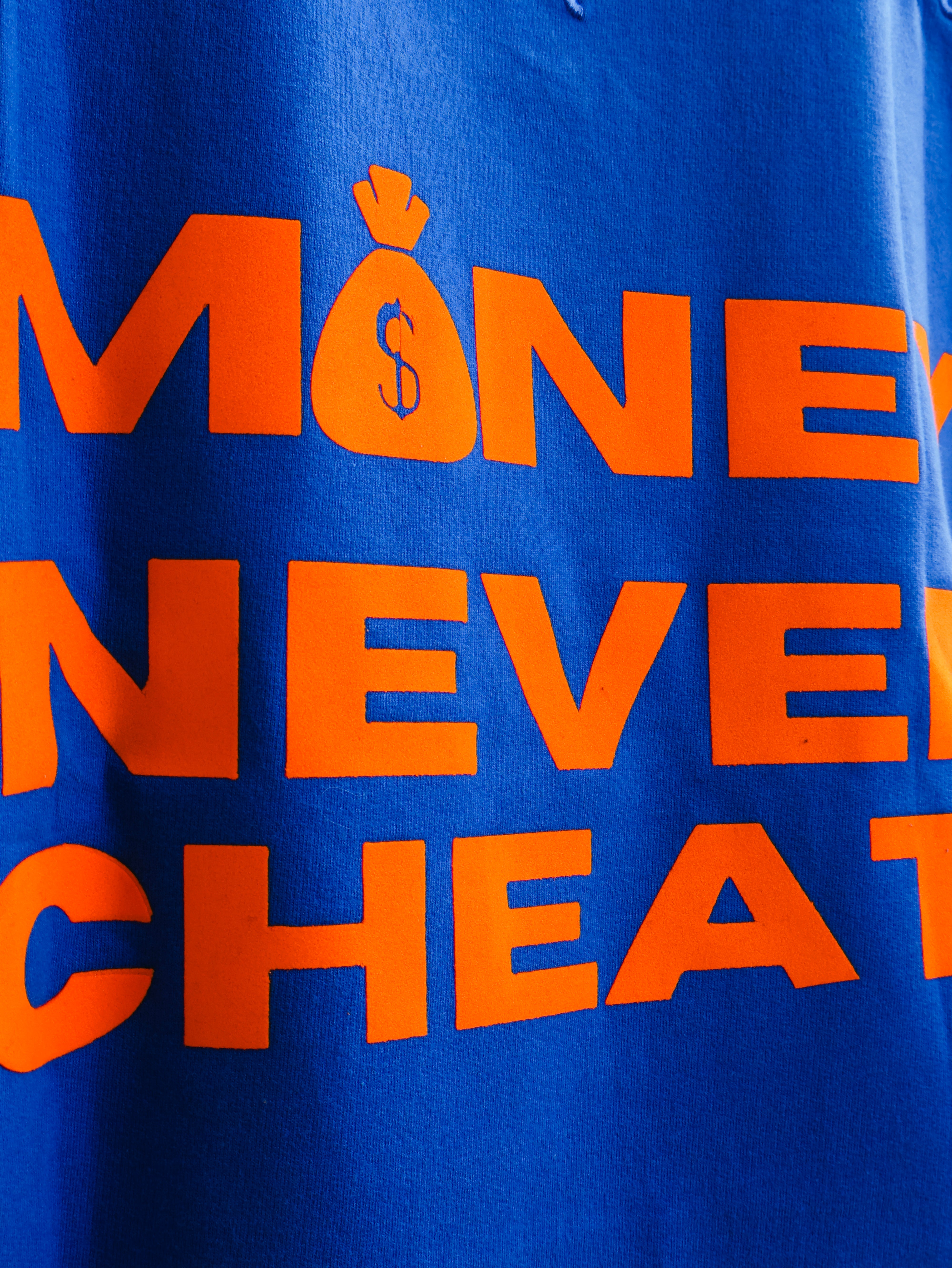 Money Never Cheats T-Shirt